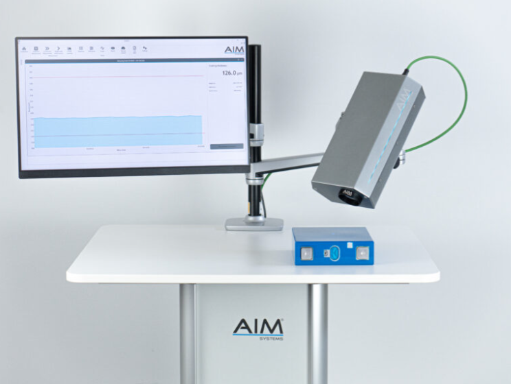 AIM CoatPro on articulating arm for single-point coating thickness measurement