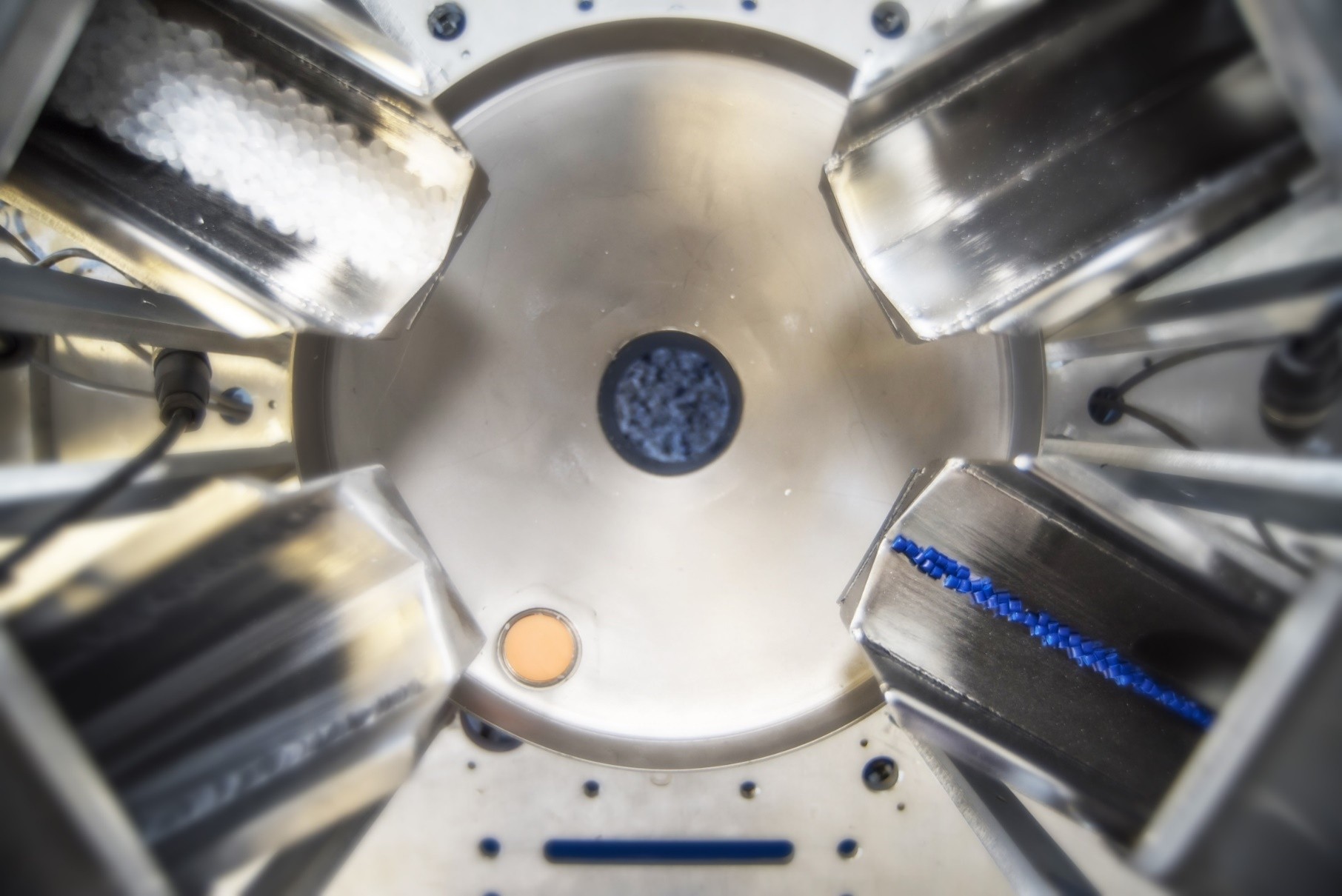 Vibratory feeders metering plastics resin into a gravimetric blender